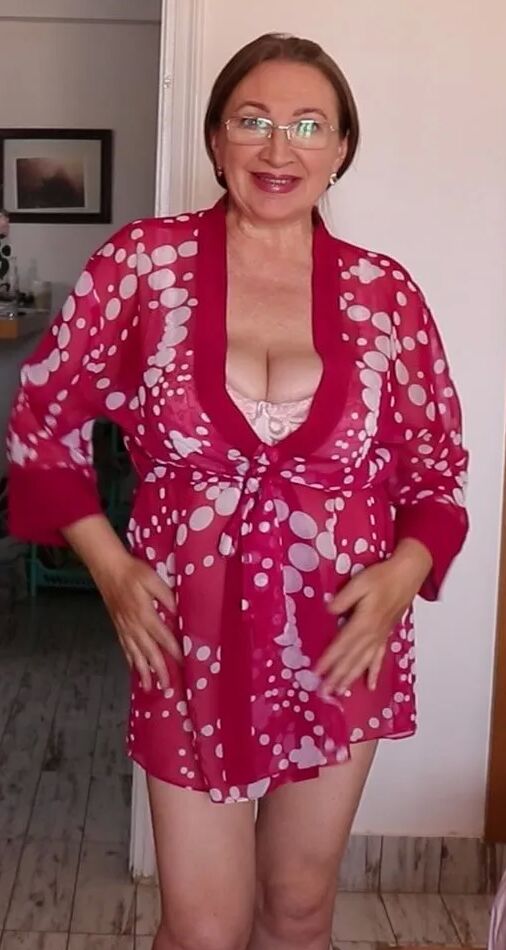 Hot granny with huge natural boobs seducing you
