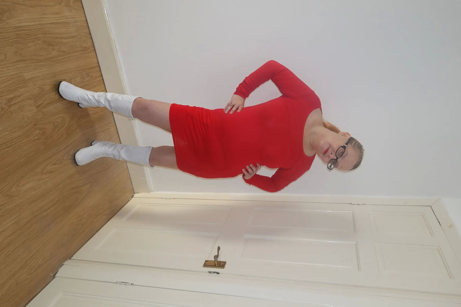 Wearing red dress, Stockings and suspenders and boots