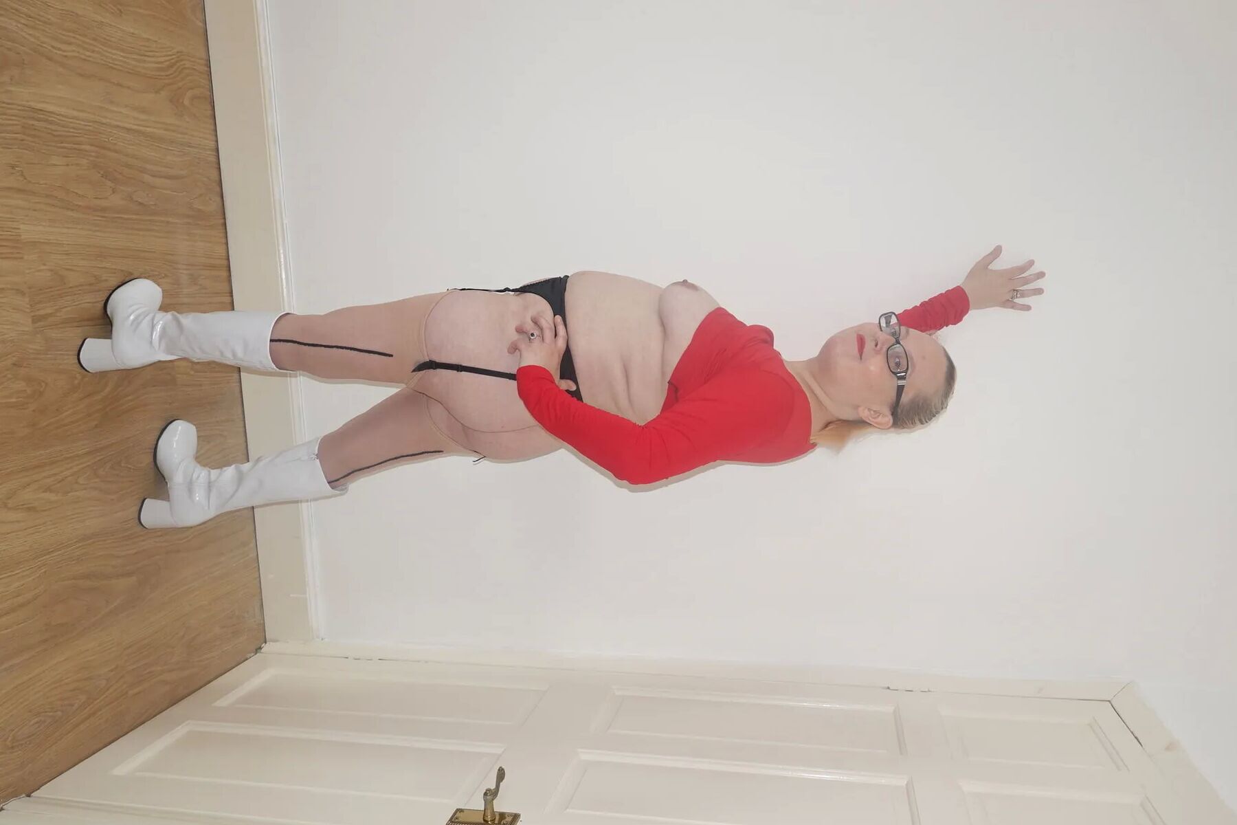 Wearing red dress, Stockings and suspenders and boots