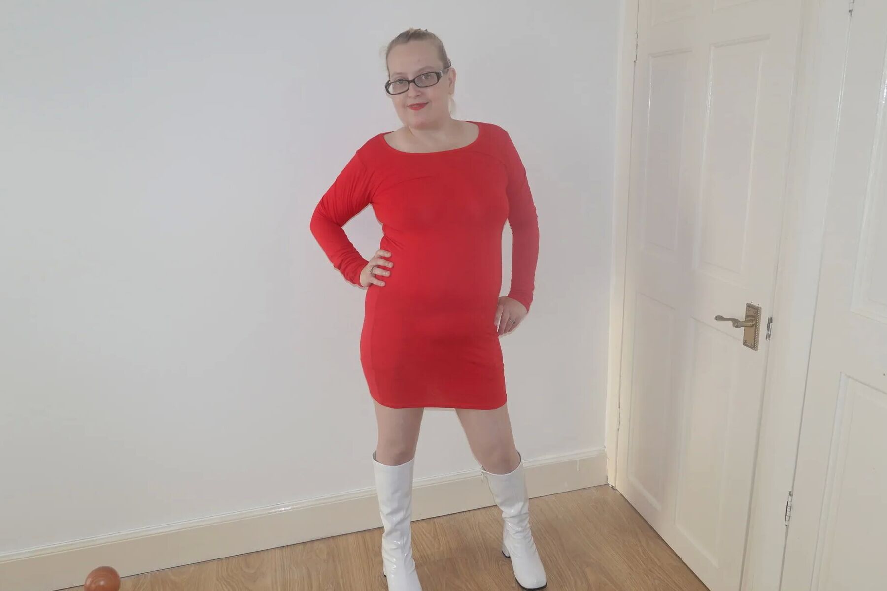 Wearing red dress, Stockings and suspenders and boots