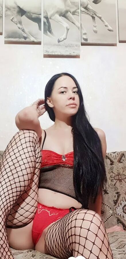 Big booty chick loves to tease with fishnets