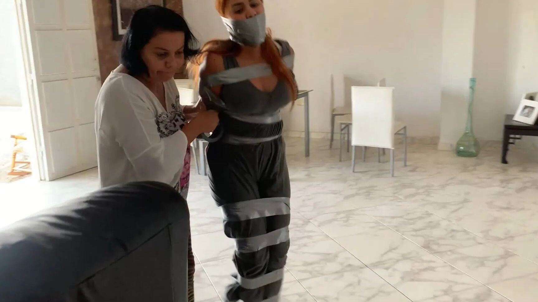 Hogtaped Student Lectured With Foot Whipping In Tape Bondage