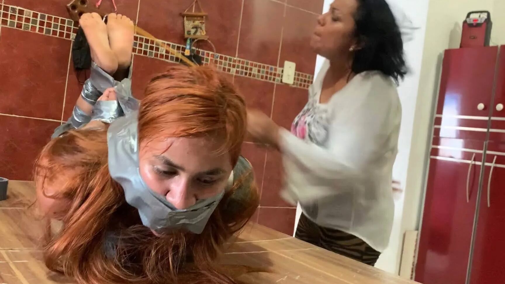Hogtaped Student Lectured With Foot Whipping In Tape Bondage