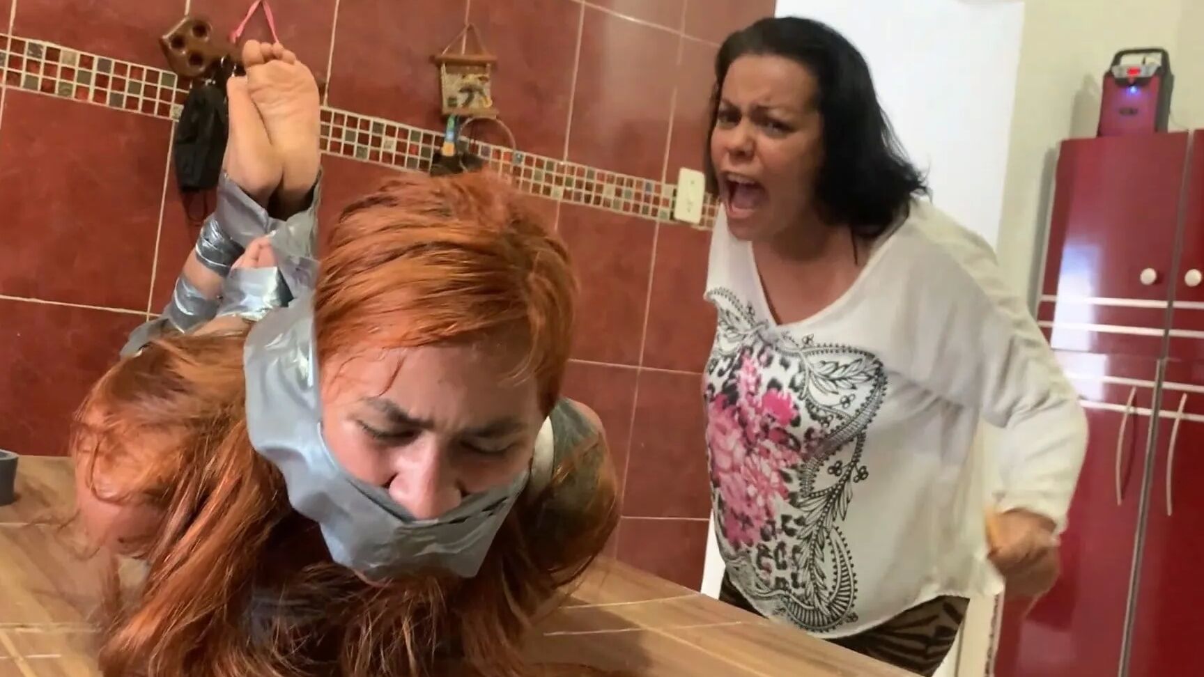 Hogtaped Student Lectured With Foot Whipping In Tape Bondage