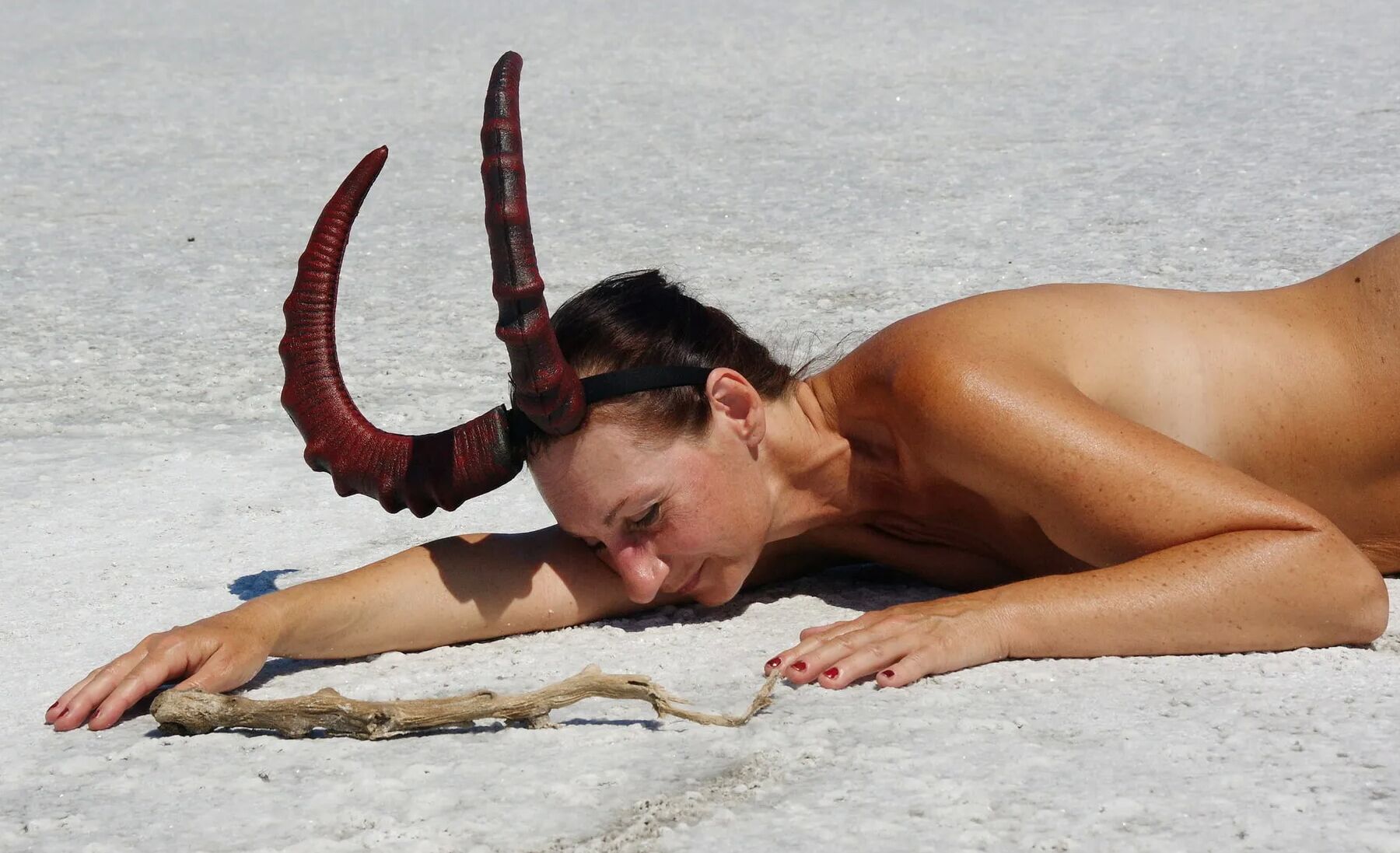 Lying naked on the salt of the saltlake Elton - Russia