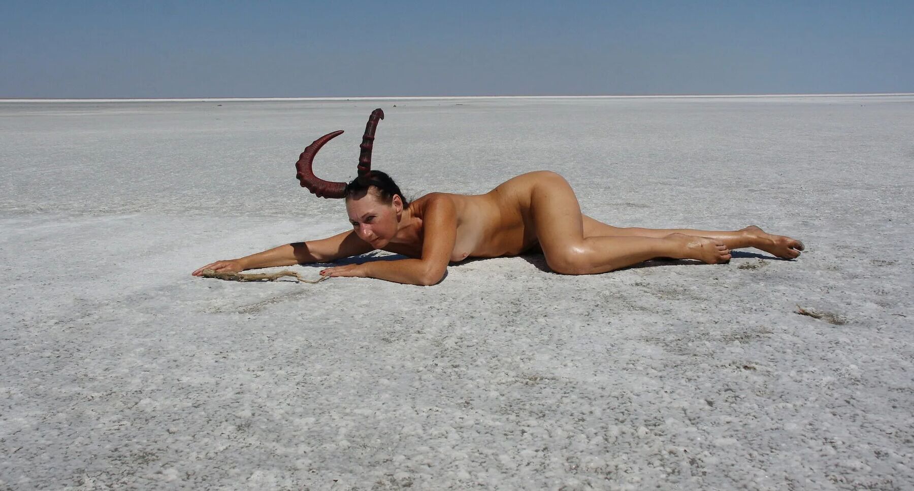 Lying naked on the salt of the saltlake Elton - Russia