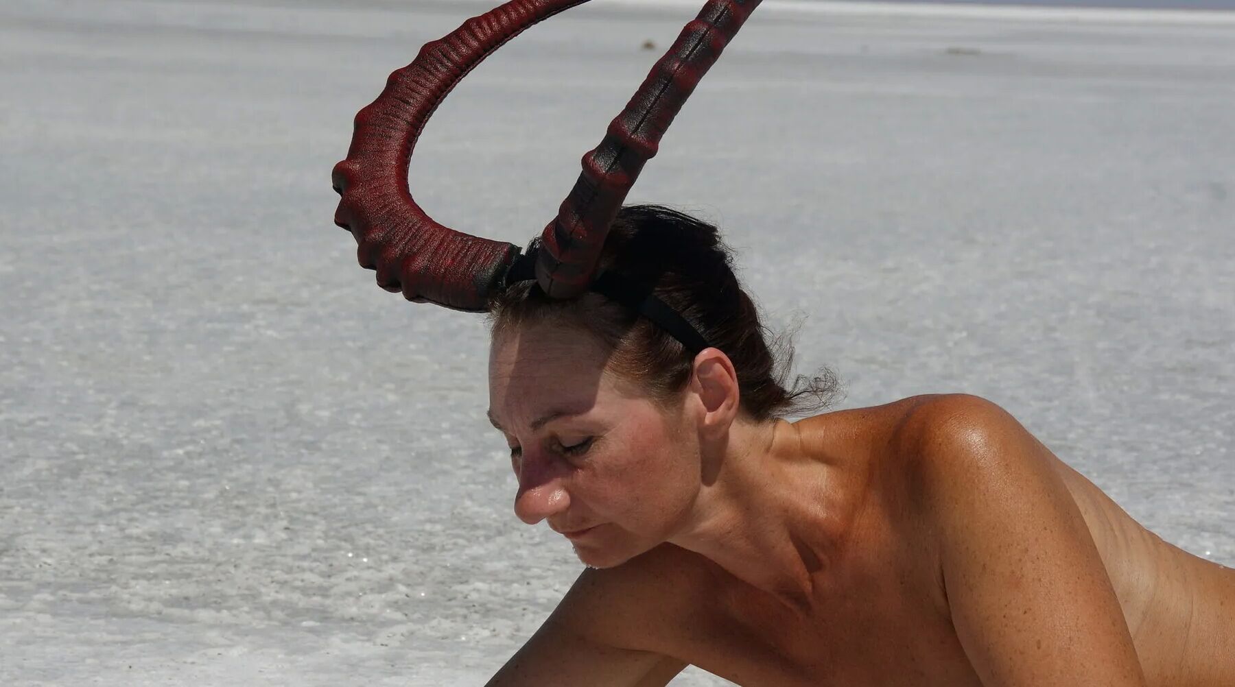 Lying naked on the salt of the saltlake Elton - Russia