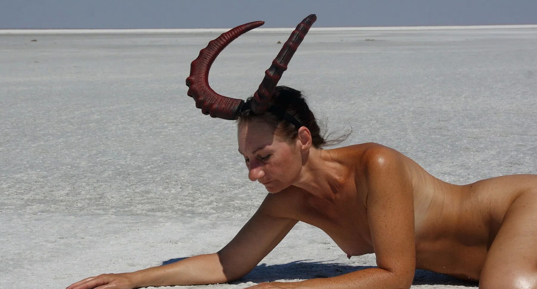 Lying naked on the salt of the saltlake Elton - Russia