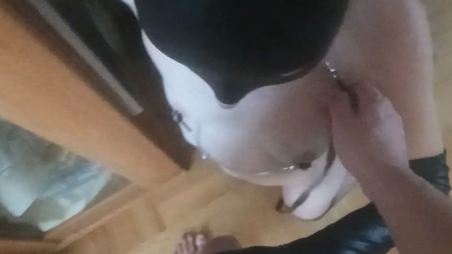 Slut on a leash in fishnet stocking sucking big dick