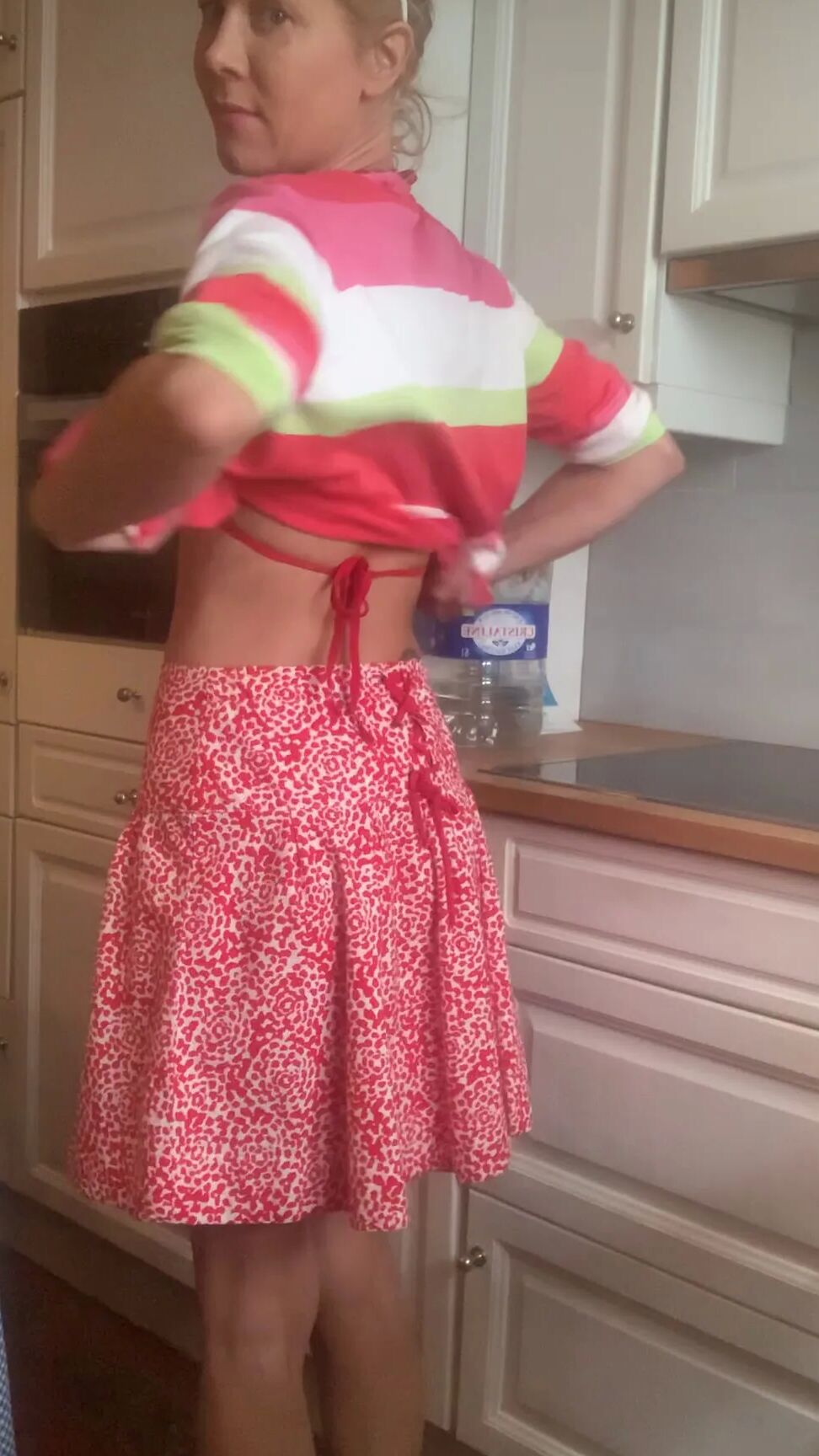 Undressing in the kitchen