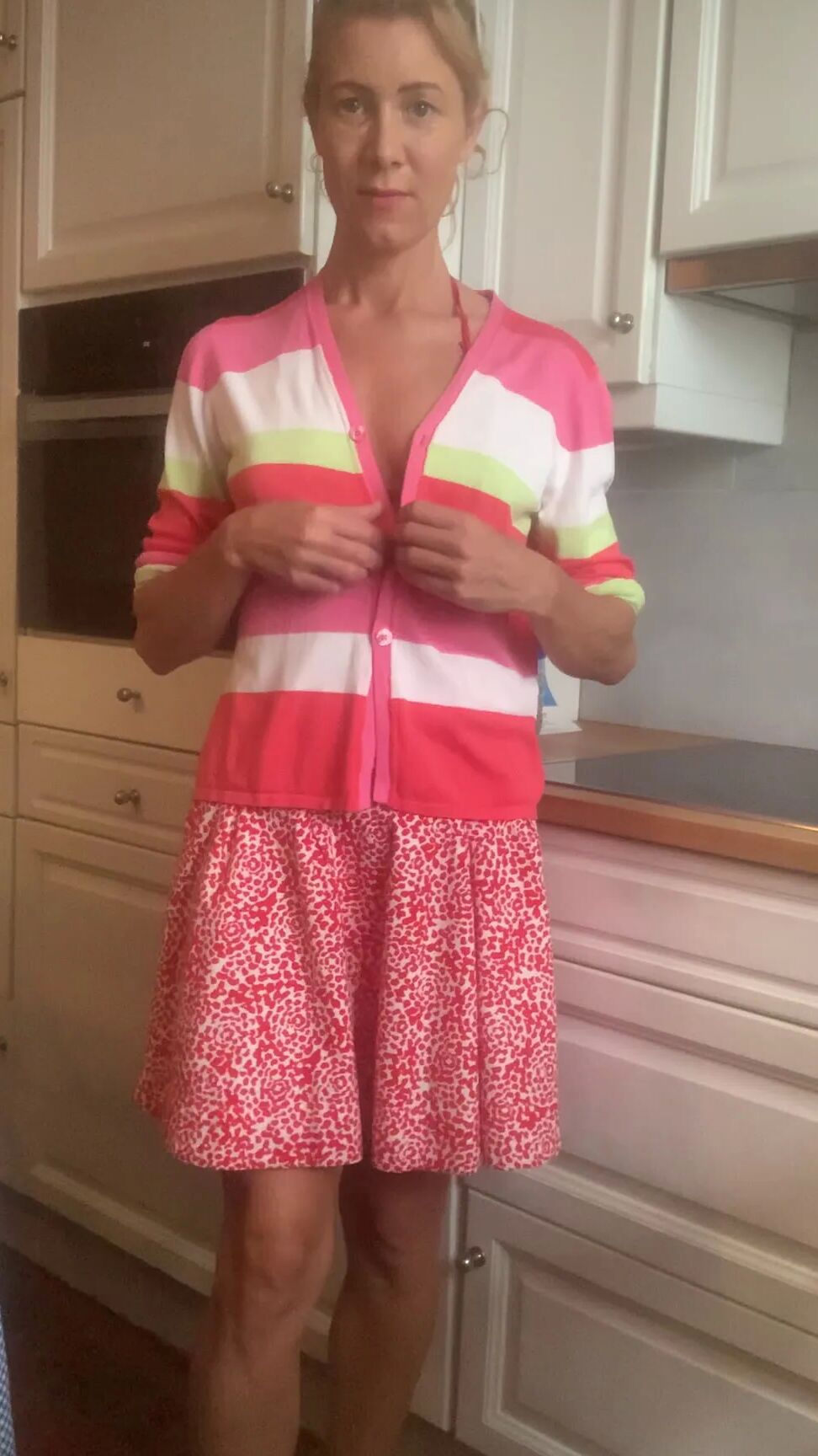 Undressing in the kitchen