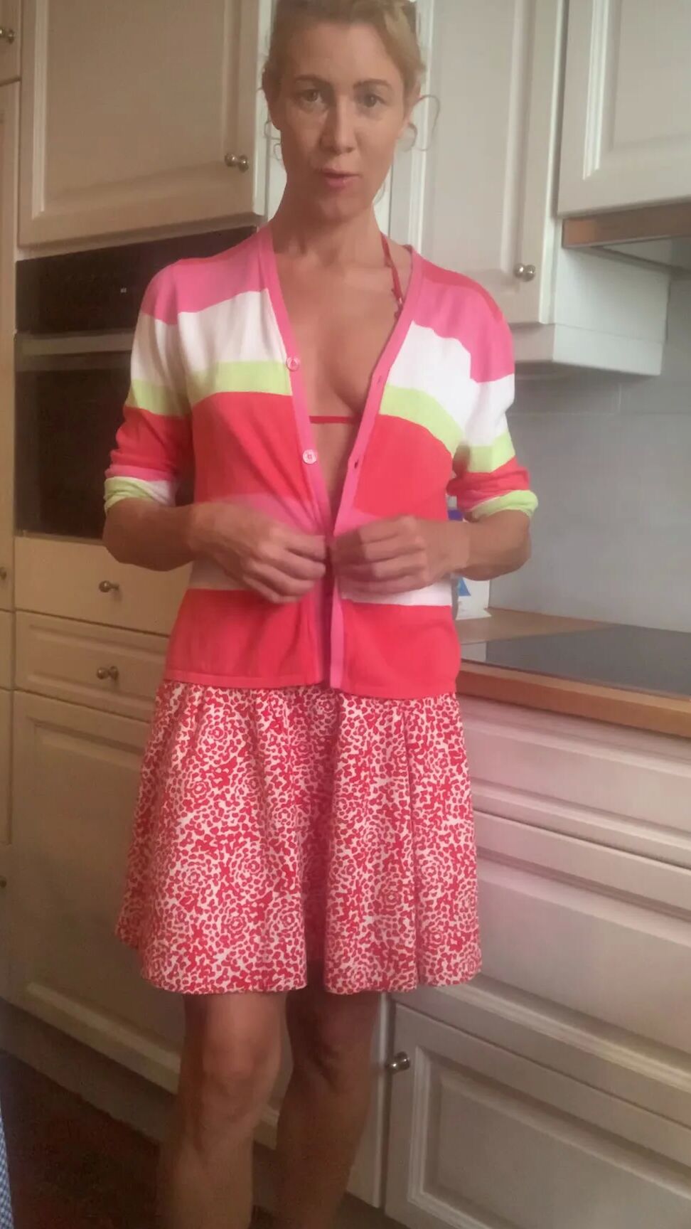 Undressing in the kitchen