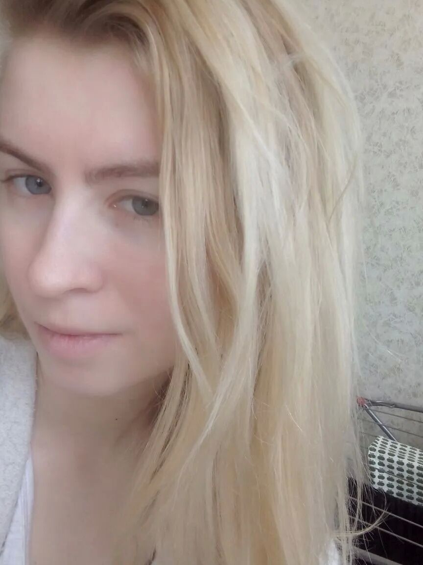 Blue eyed beauty shows off her tiny tits
