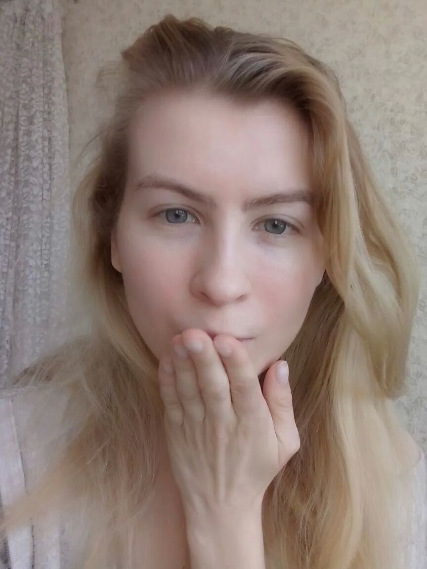 Blue eyed beauty shows off her tiny tits