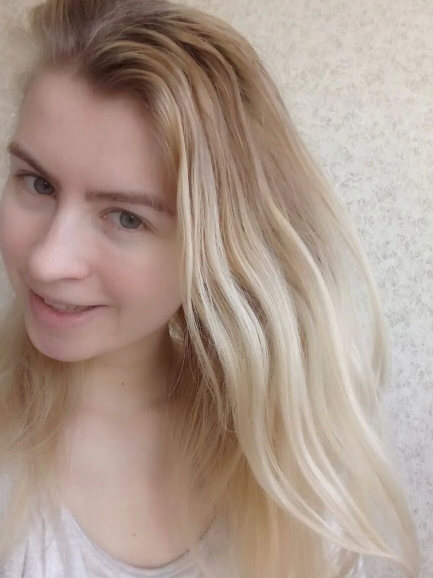 Blue eyed beauty shows off her tiny tits