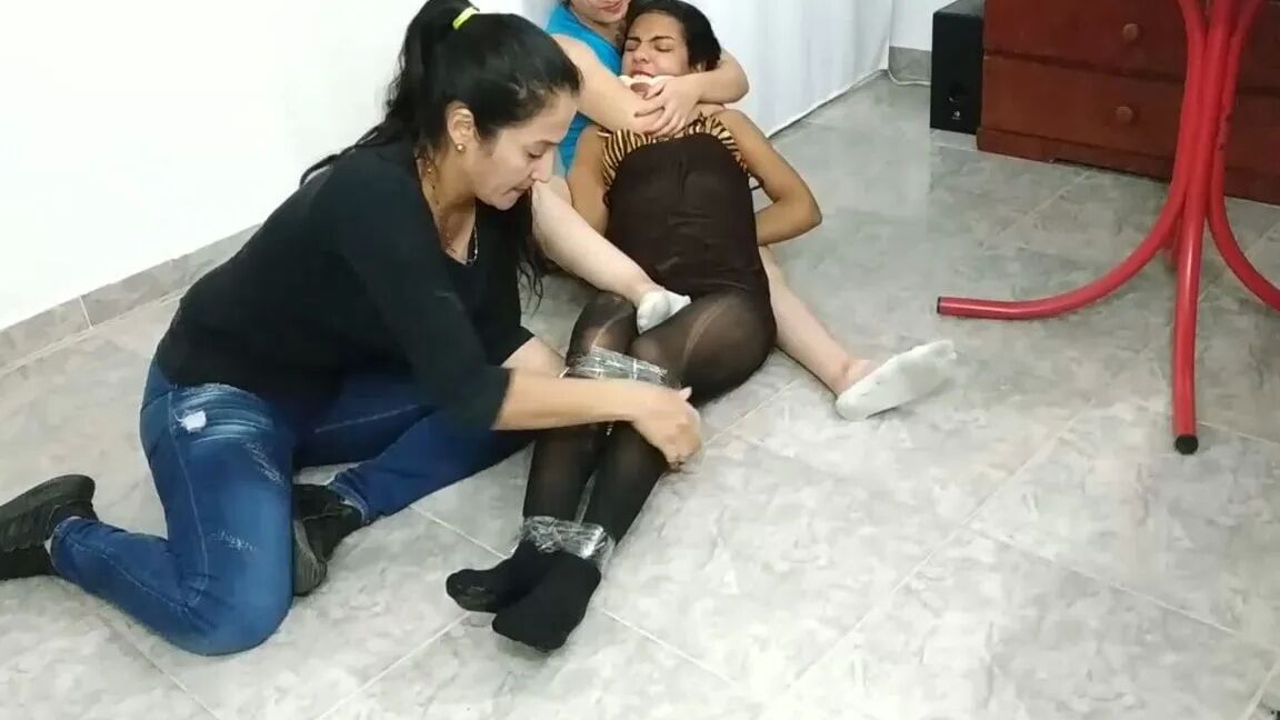 Hogtied Girl Panty Hooded And Ball Gagged