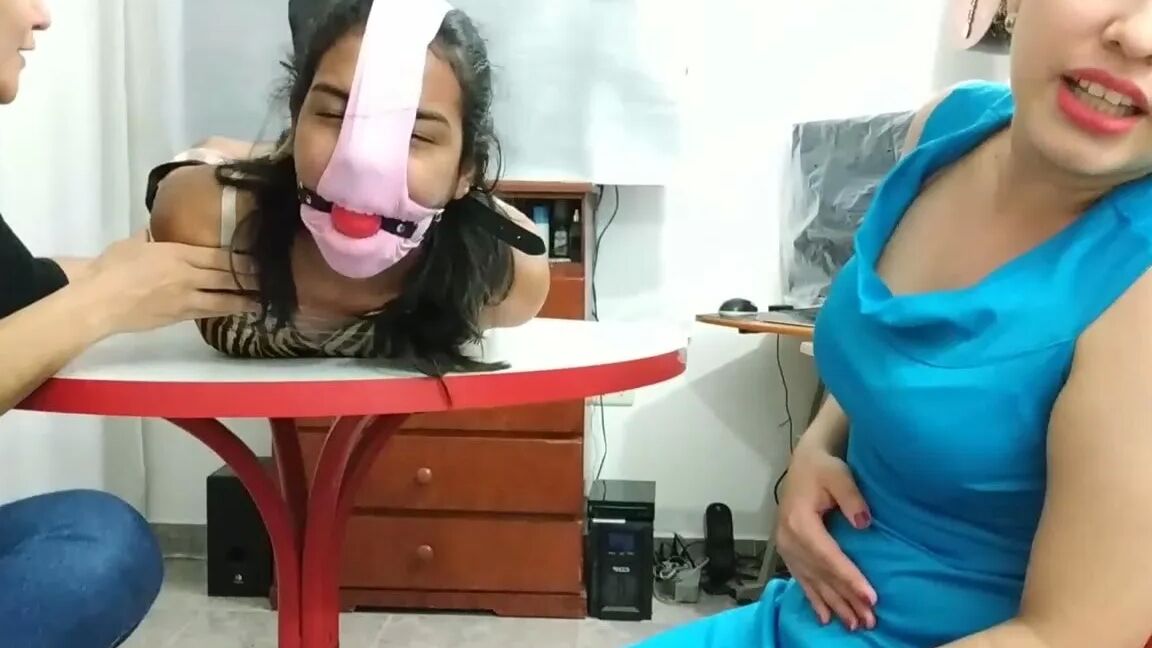 Hogtied Girl Panty Hooded And Ball Gagged
