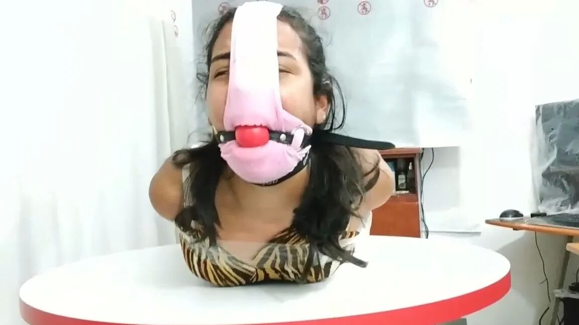 Hogtied Girl Panty Hooded And Ball Gagged