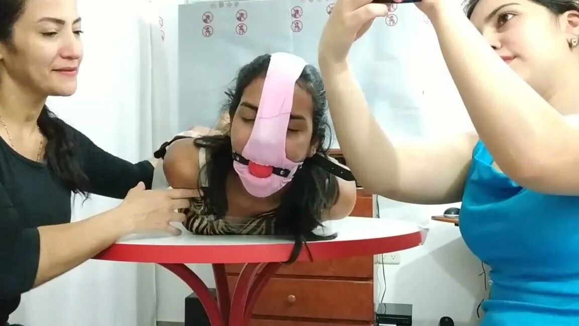 Hogtied Girl Panty Hooded And Ball Gagged
