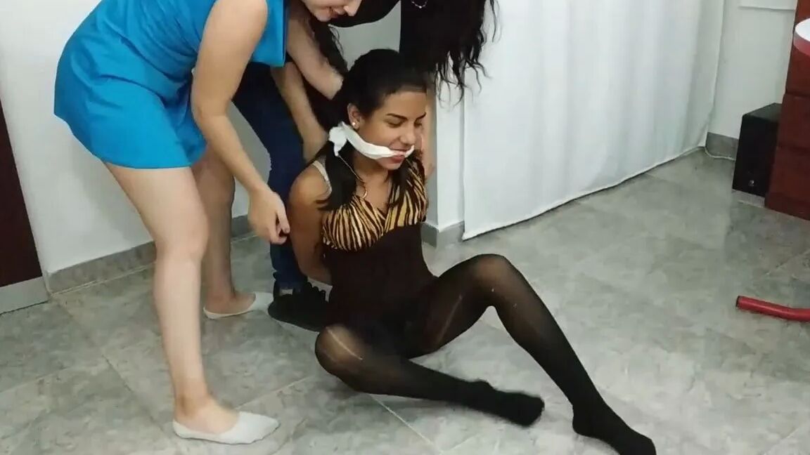 Hogtied Girl Panty Hooded And Ball Gagged