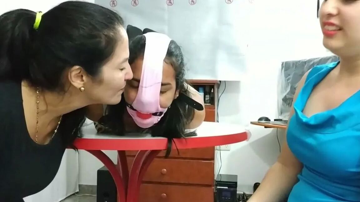 Hogtied Girl Panty Hooded And Ball Gagged