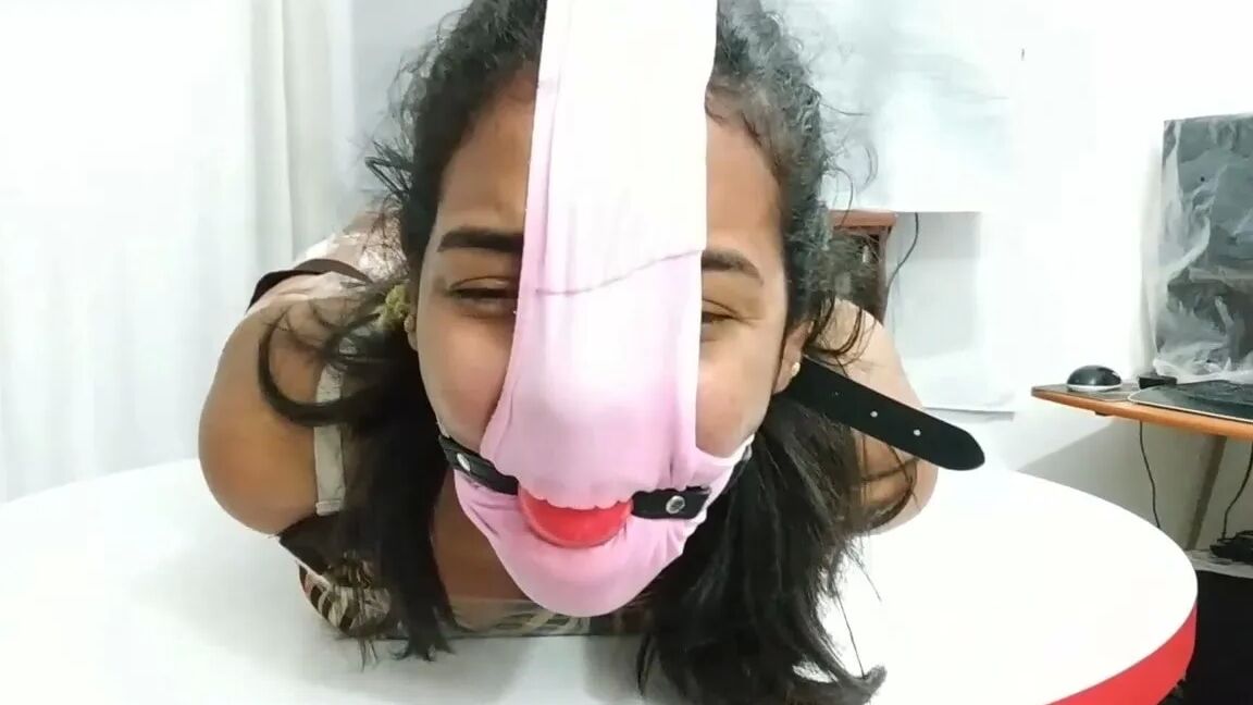 Hogtied Girl Panty Hooded And Ball Gagged