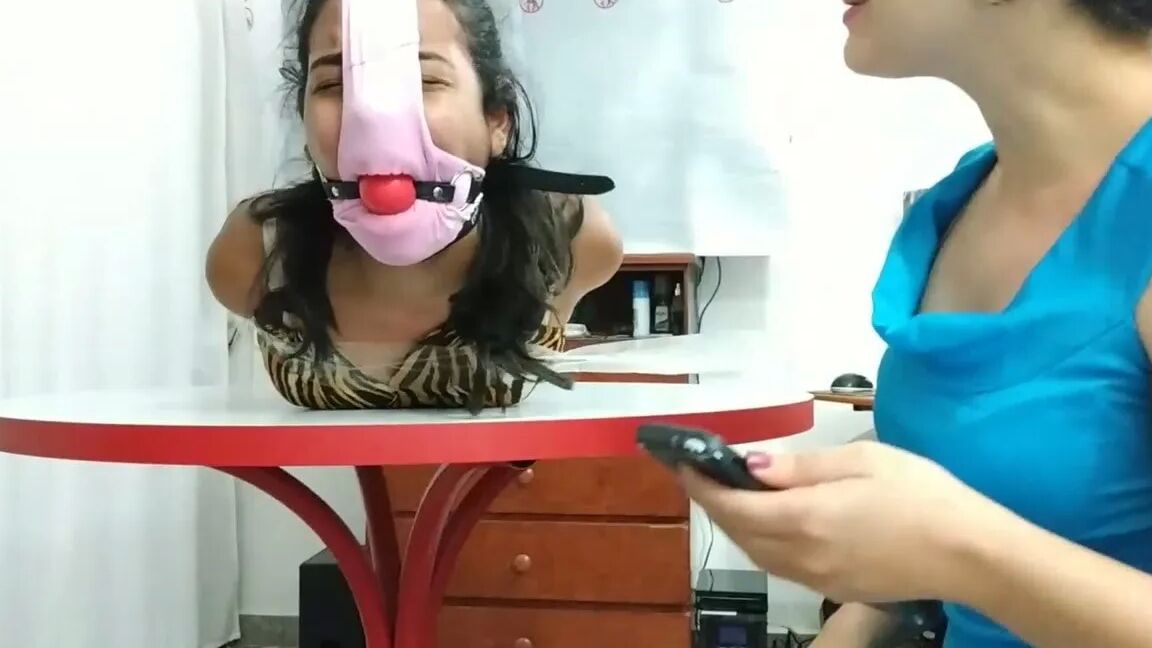 Hogtied Girl Panty Hooded And Ball Gagged