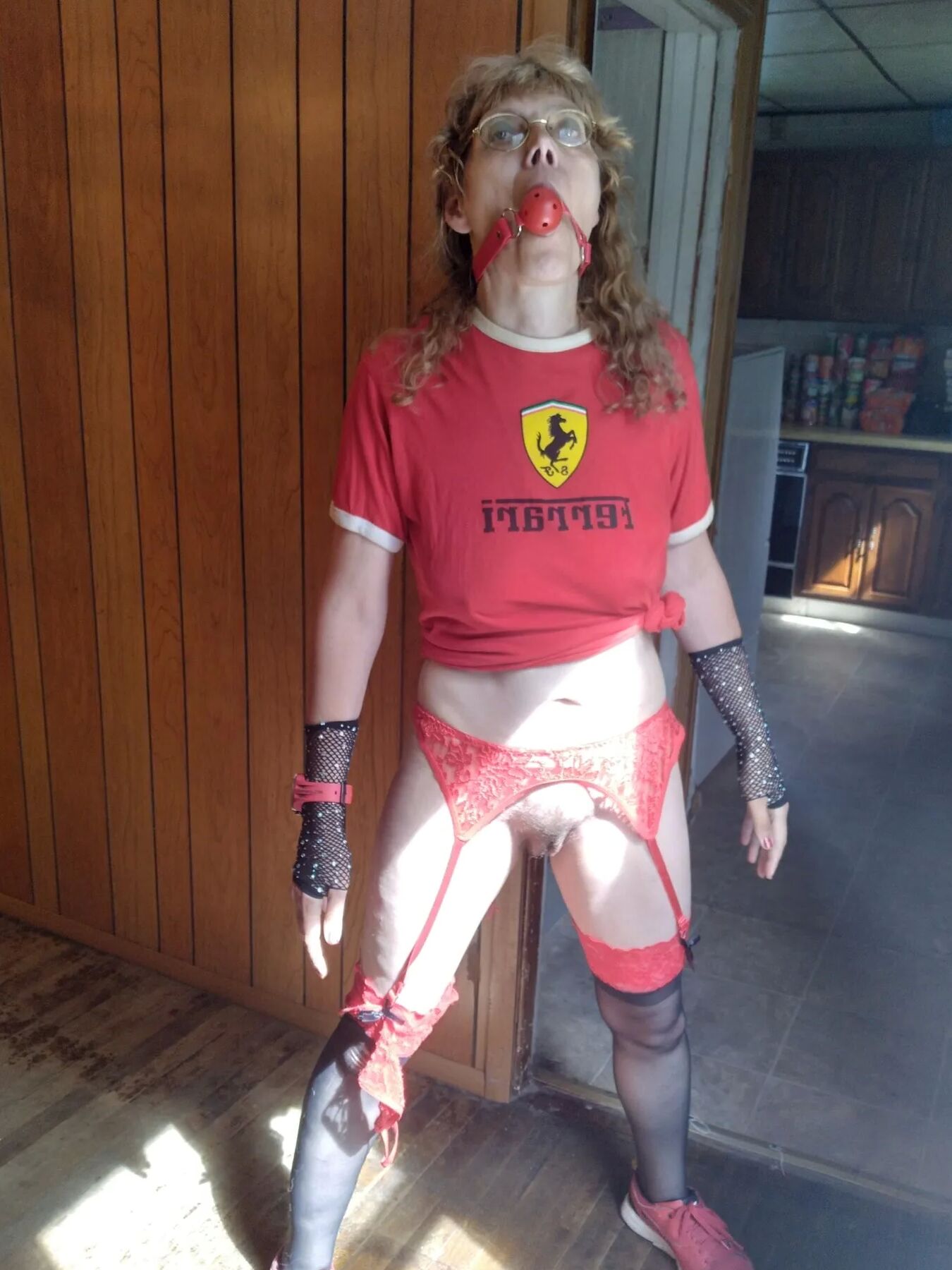 Red and black garters Ferrari outfit on breakfast table
