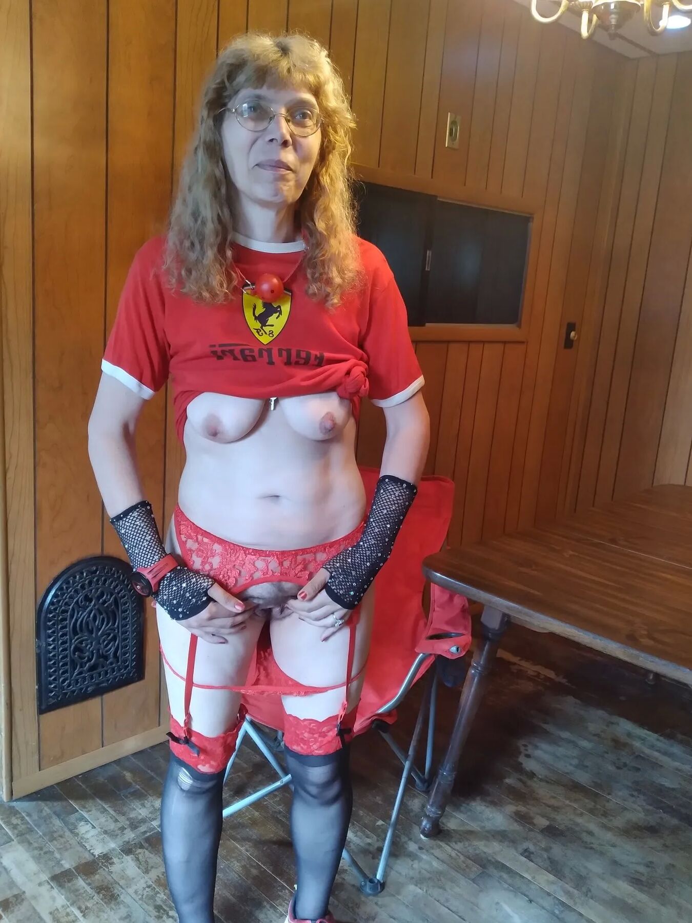 Red and black garters Ferrari outfit on breakfast table