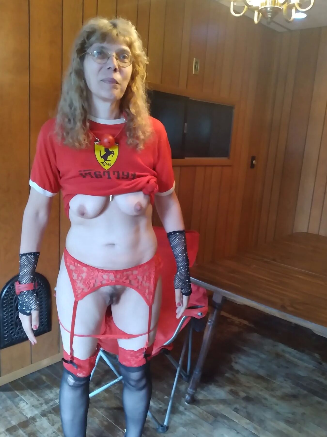 Red and black garters Ferrari outfit on breakfast table