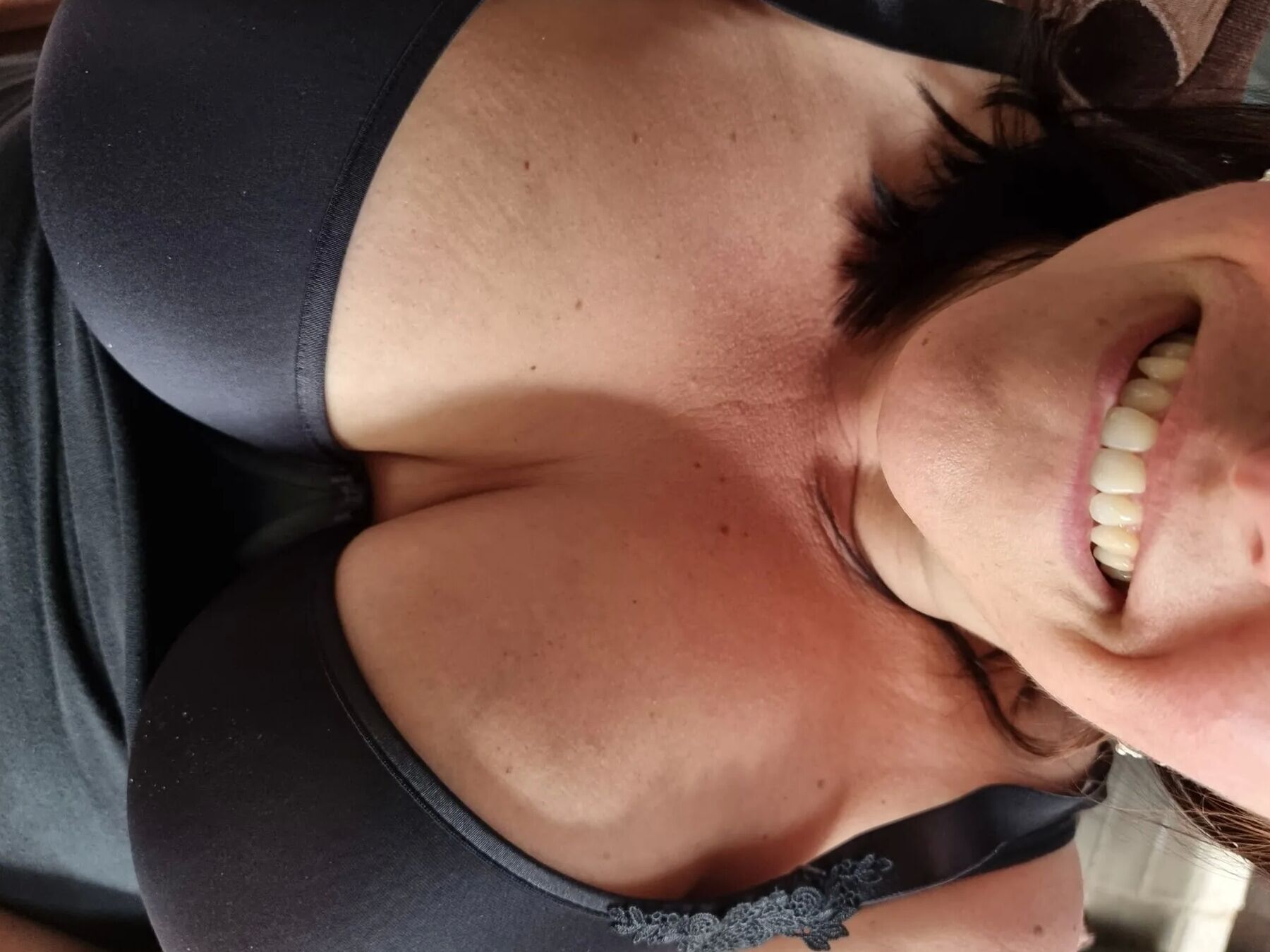 Showing off her big breasts