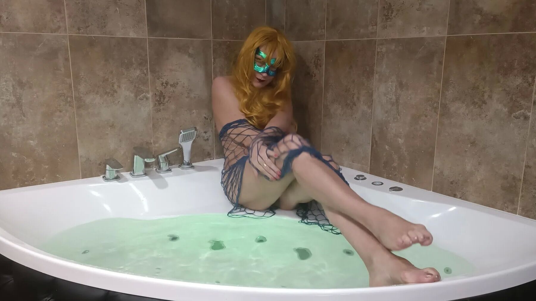 Naughty milf mermaid in jacuzzi
