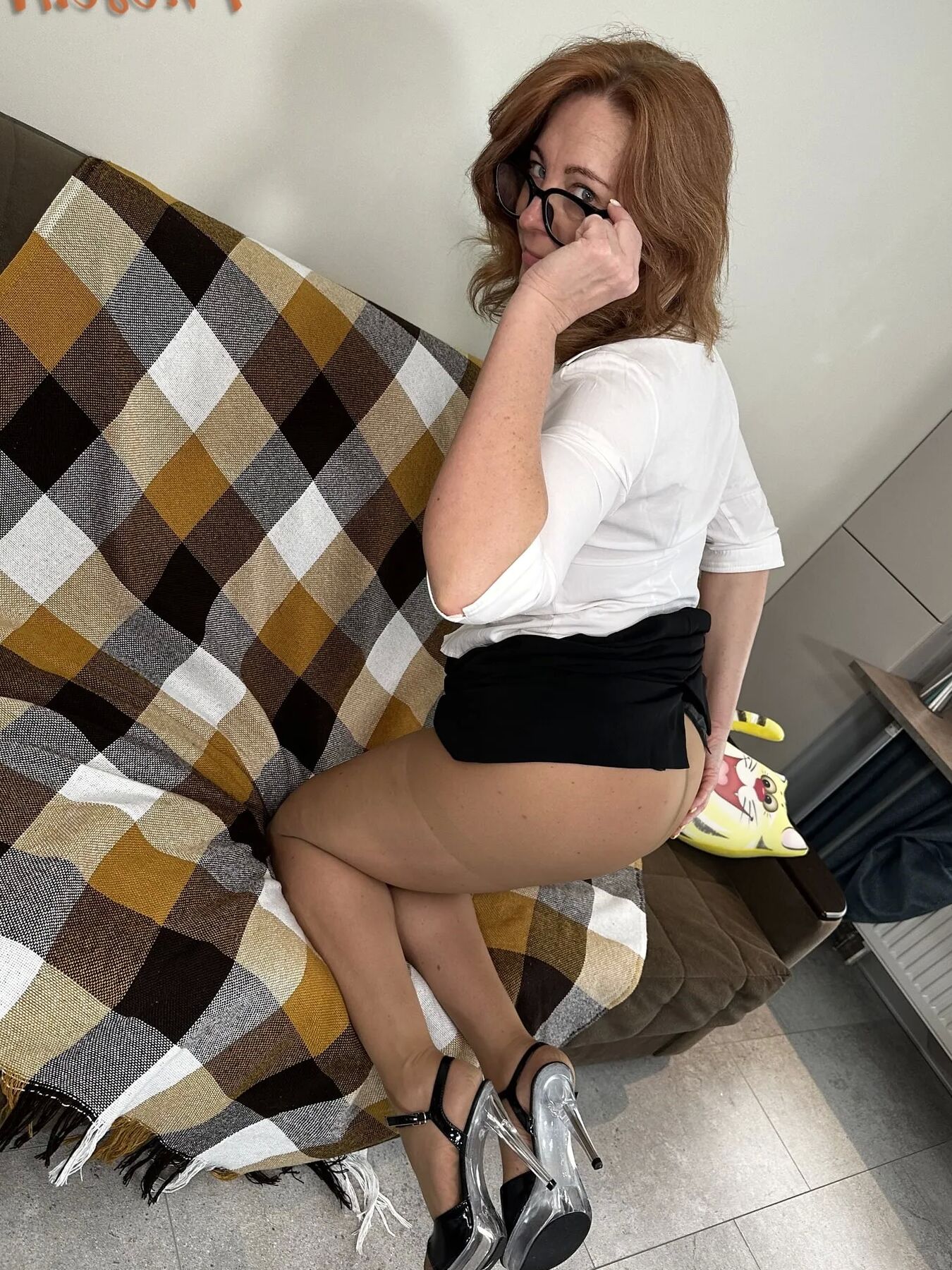 Mature Beauty Marta in Short Skirt and Tan Pantyhose