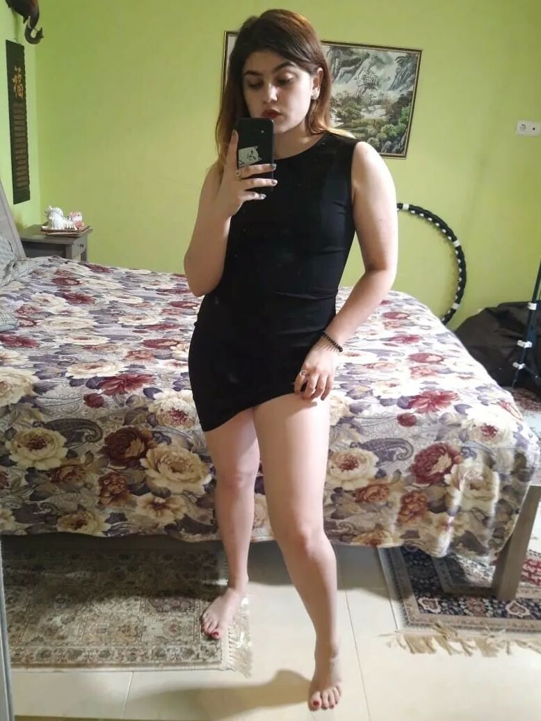 Cute brunette gets naked and takes selfies