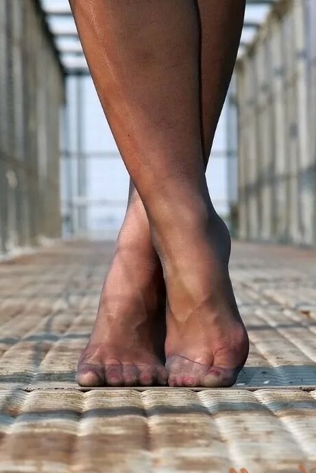 Cute Blonde Playing Outdoors In Her Pantyhose