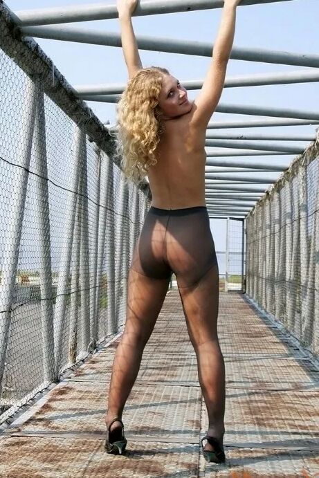 Cute Blonde Playing Outdoors In Her Pantyhose
