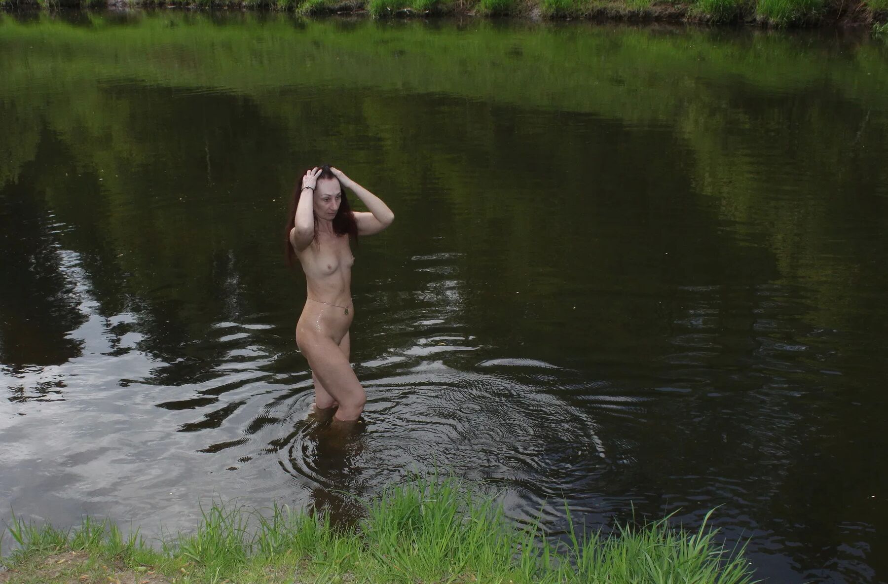 Naked in cold river