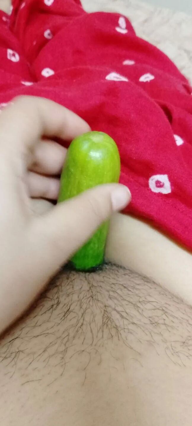 Masturbation with cucumber