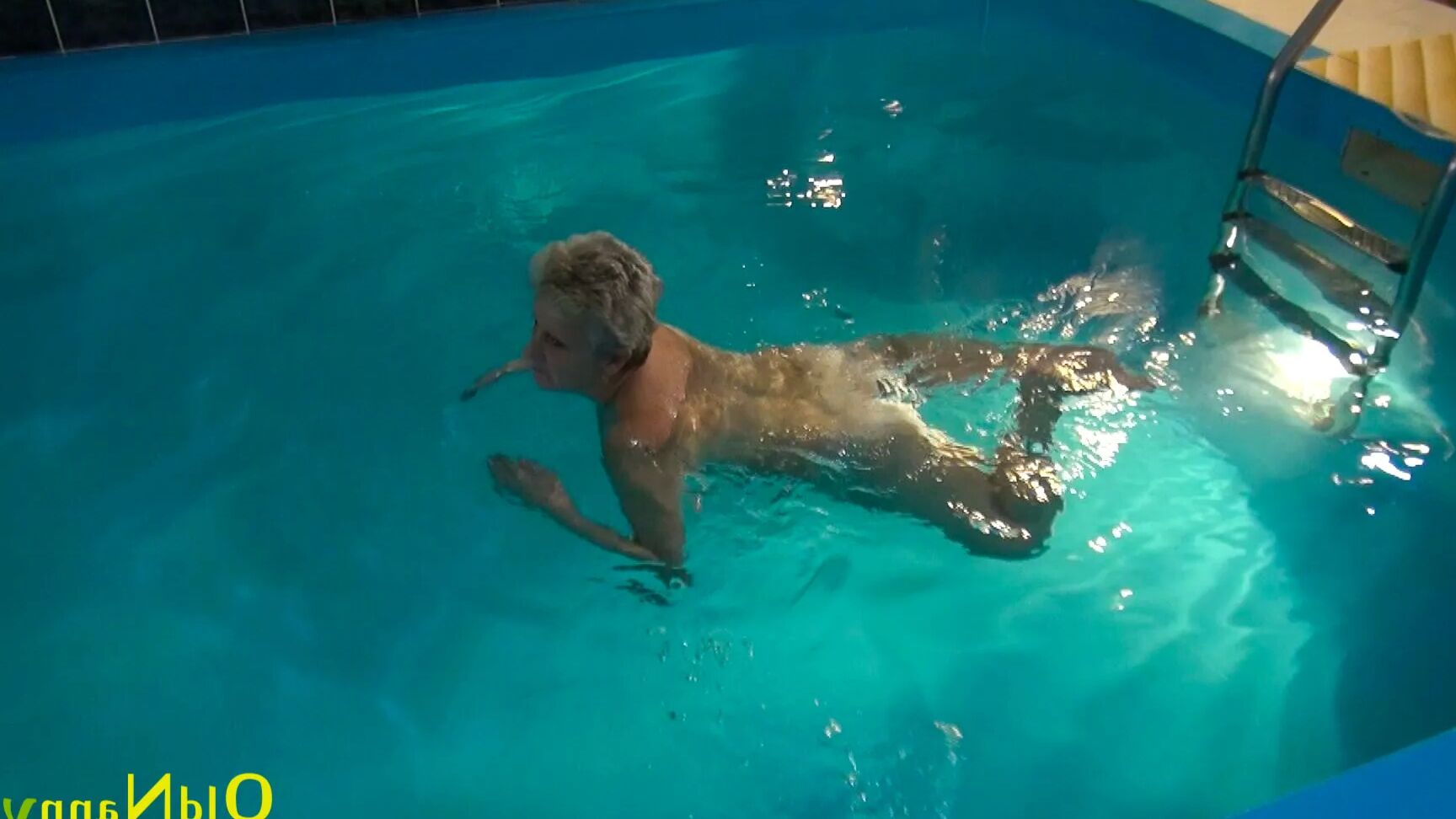 Granny Jitka frolics in the pool
