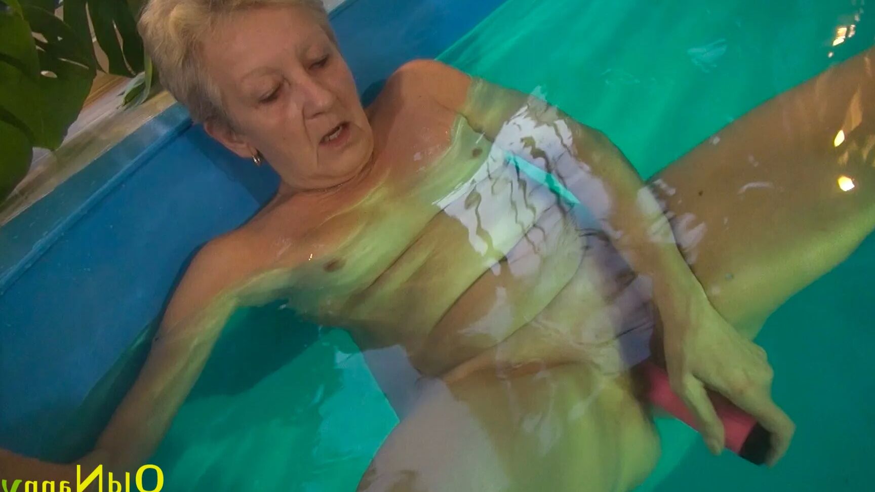 Granny Jitka frolics in the pool