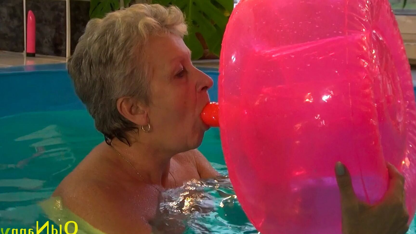 Granny Jitka frolics in the pool