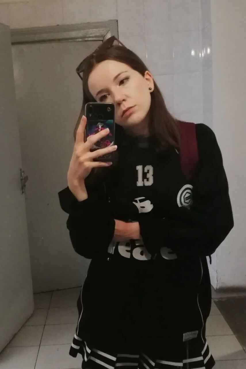 Skinny teen takes selfies in the mirror