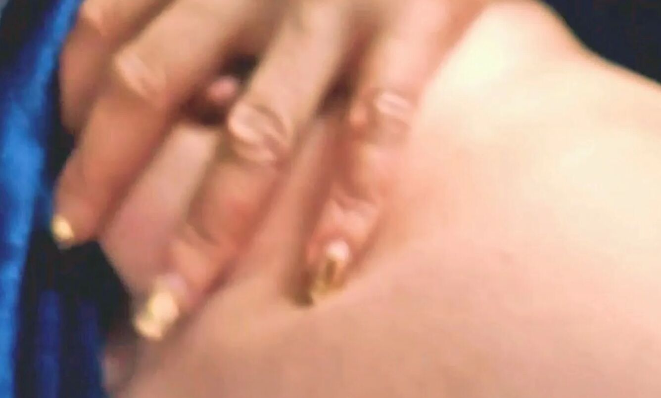 She was so excited that she pinched her own nipples