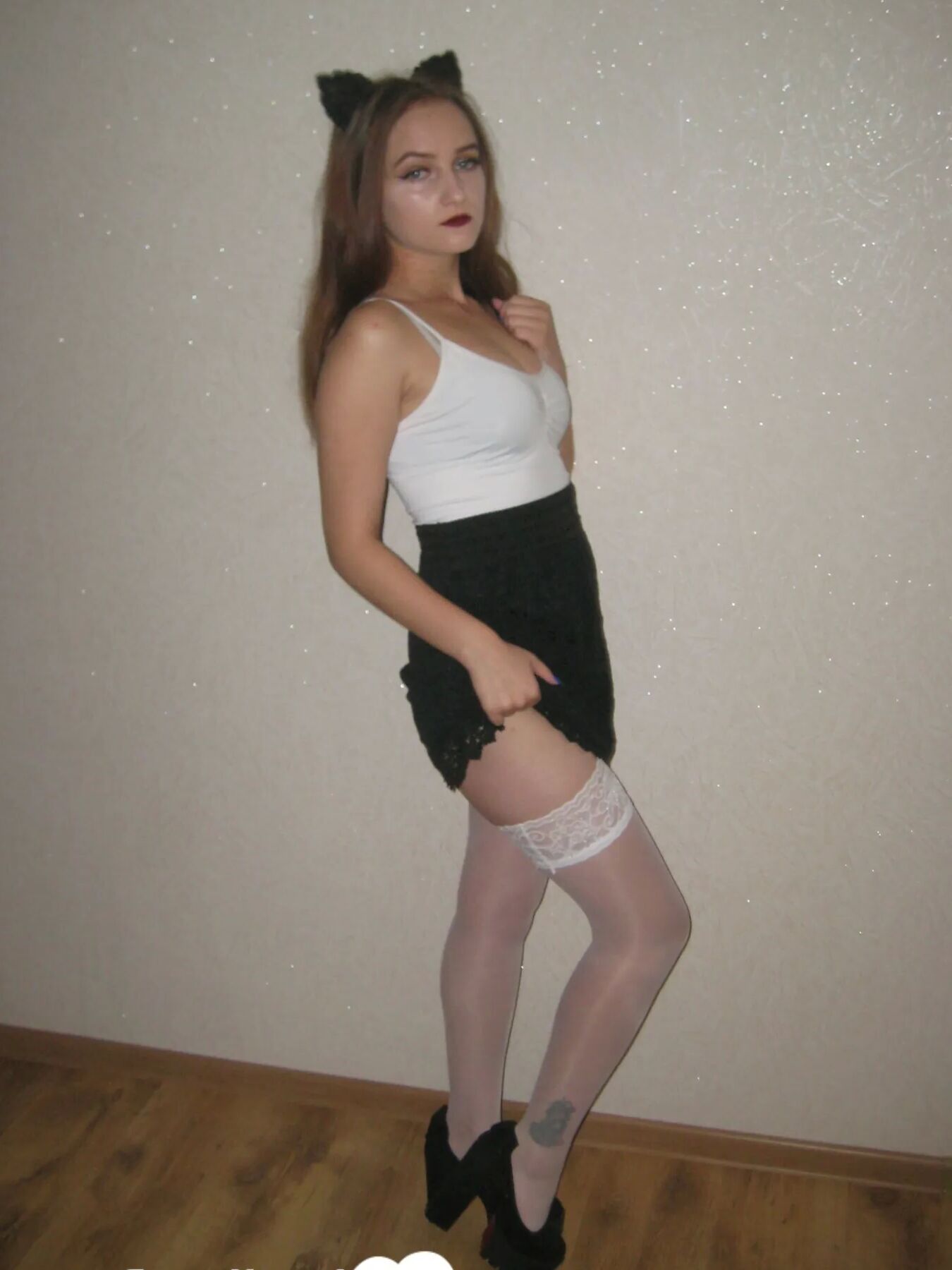 Kinky girlfriend in stockings displaying her amazing legs