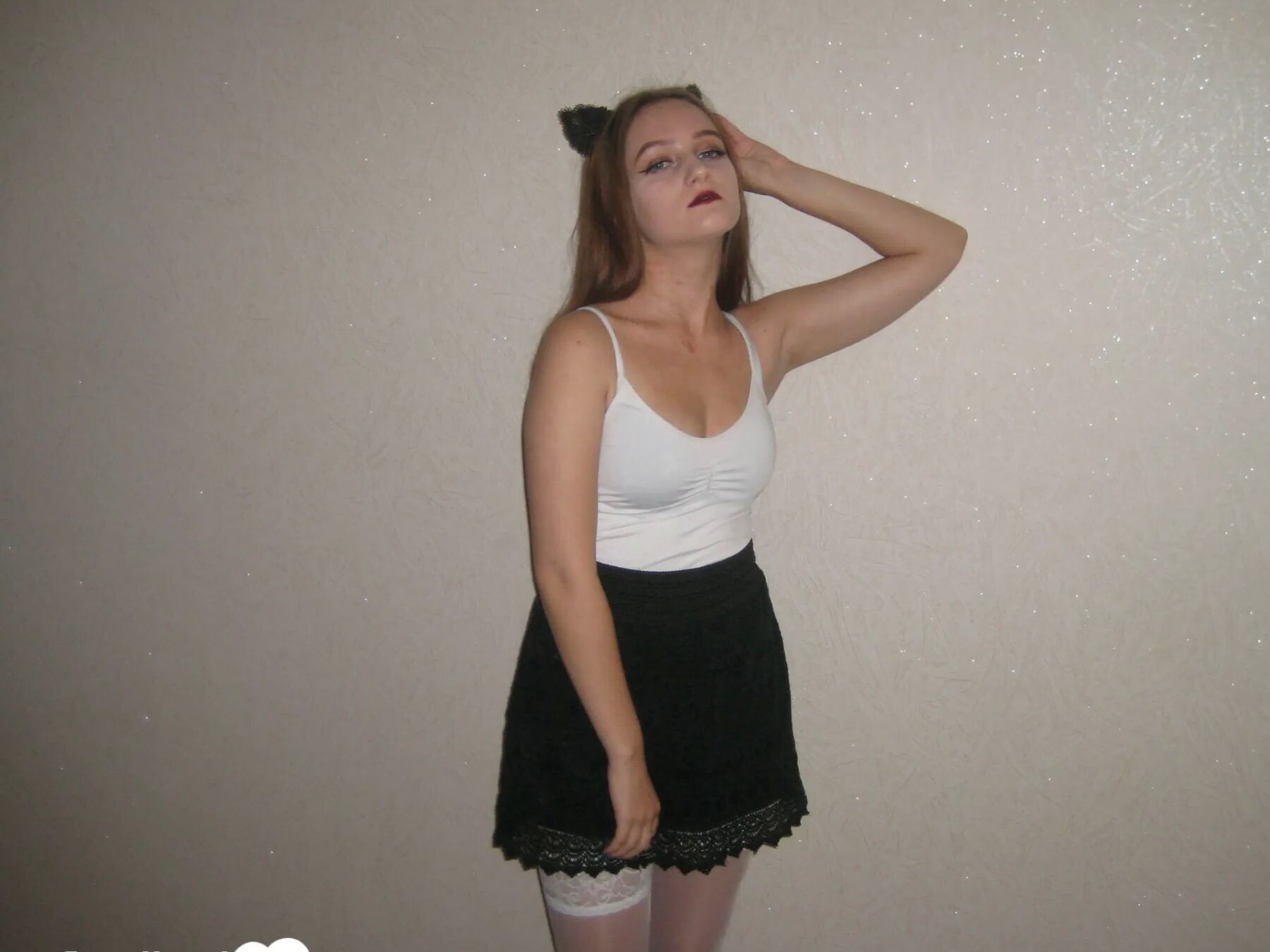 Kinky girlfriend in stockings displaying her amazing legs