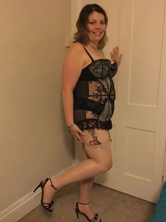 Full frilly body with stockings and suspenders