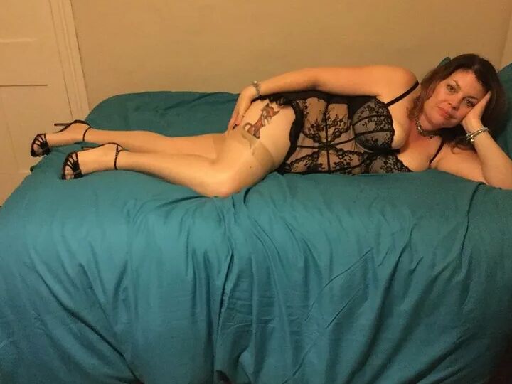 Full frilly body with stockings and suspenders