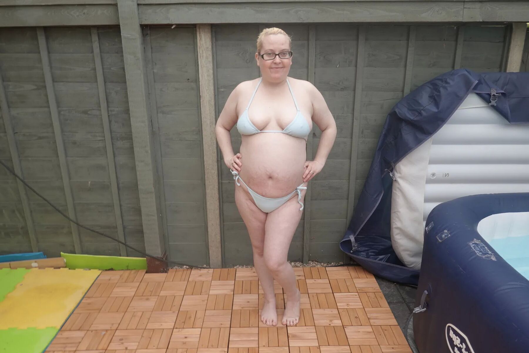 Big breasts wife in bikini