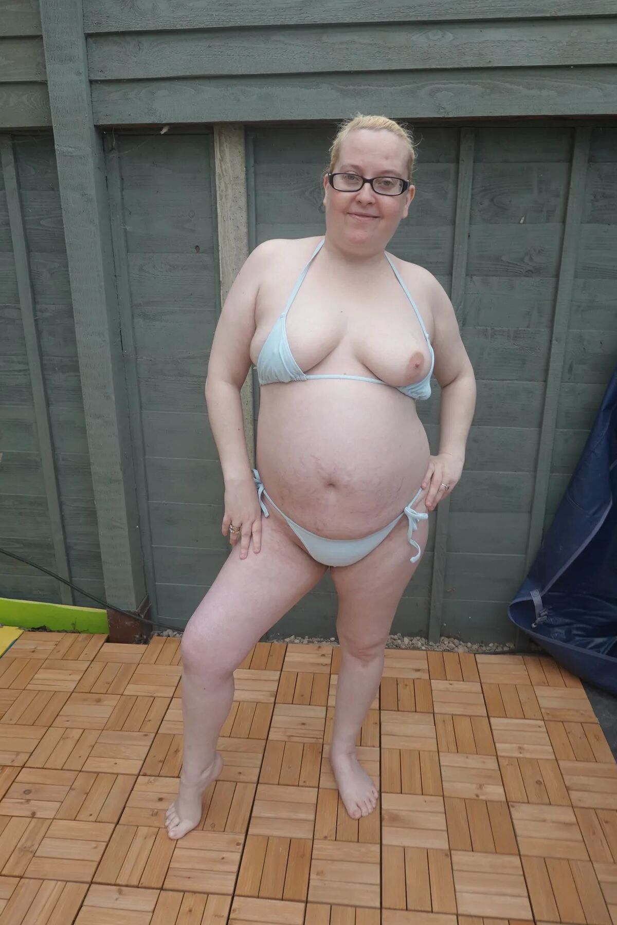 Big breasts wife in bikini