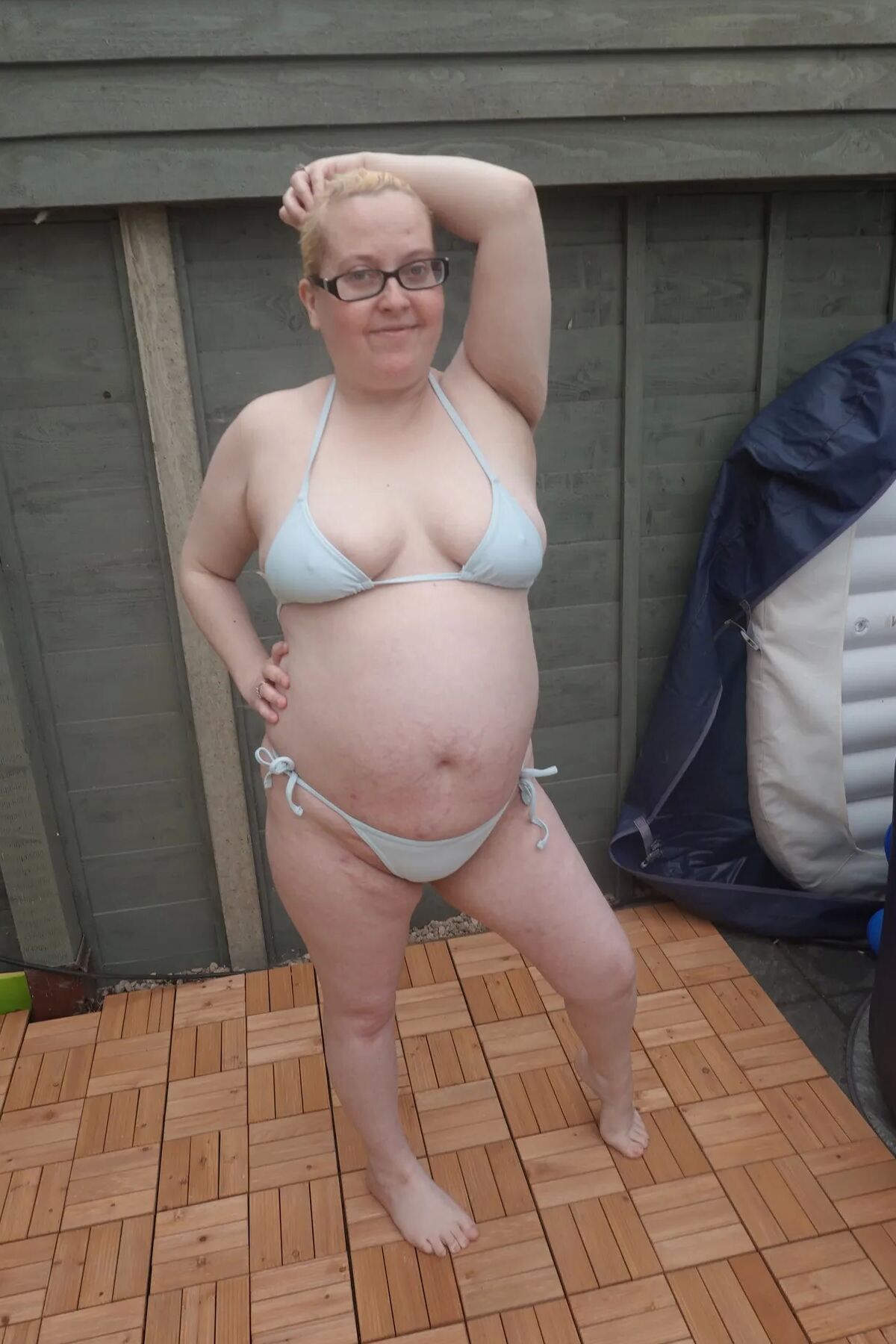 Big breasts wife in bikini